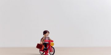 lavoratore lego bicicletta