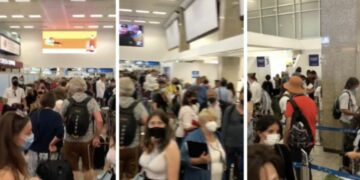 File interminabili per il controllo dei certificati COVID-19: aeroporto nel caos, turisti furibondi